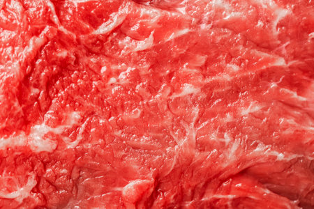 Red beef meat close up texture. Meat food background. Texture or background of tasty fresh meatの写真素材
