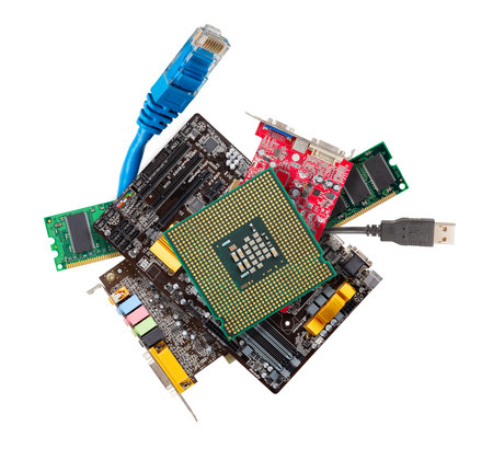 Heap of electronic hardware PC components isolated on white background. CPU, motherboard, DIMM RAM module, Graphics card, USB cable, RJ-45 patch cord.の写真素材