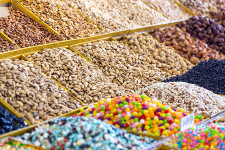 Dried fruits and nuts at the Osh Bazaar market in Bishkek, Kyrgyzstan, Central Asia.の写真素材
