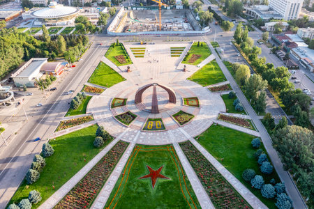 Aerial drone view of the Monument of Victory and Victory square in Bishkek, the capital of Kyrgyzstan.の写真素材