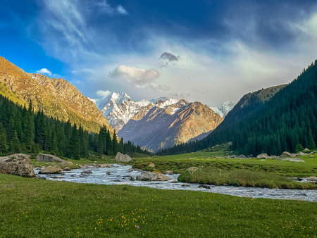 Djeti-Oguz valley landscape with mountains and river. Tien Shan mountain ridge, located in the southeast of the Issyk-Kul basin, Kyrgyzstan.の写真素材