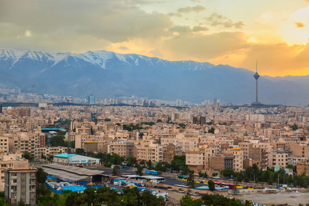 Beautiful cityscape sunset panorama of Tehran city, mountains and Milad tower in during colorful sunset in Iran.の写真素材