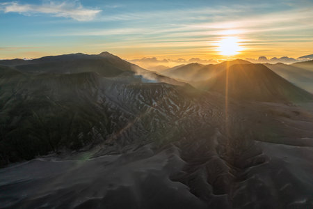 Aerial drone view of famous Bromo volcano during sunrise in Bromo Tengger Semeru National Park, East...