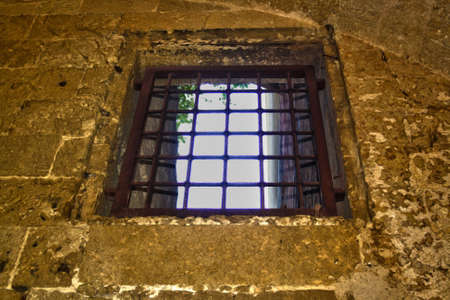 window with grottaglie castle grating