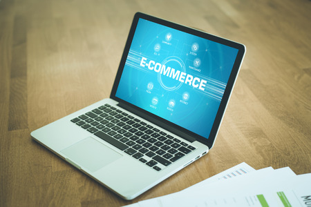 E-COMMERCE chart with keywords and icons on screenの写真素材