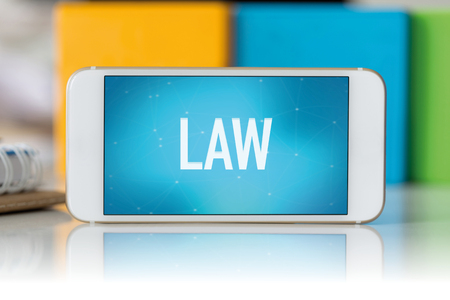 Smart phone which displaying Lawの写真素材