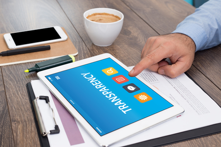 TRANSPARENCY CONCEPT ON TABLET PC SCREENの写真素材