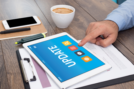 UPDATE CONCEPT ON TABLET PC SCREENの写真素材