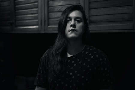 self-portrait during the black and white quarantine, man with long hairの写真素材