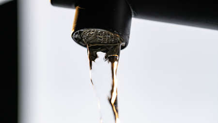 hand splashing in water close-up.の写真素材