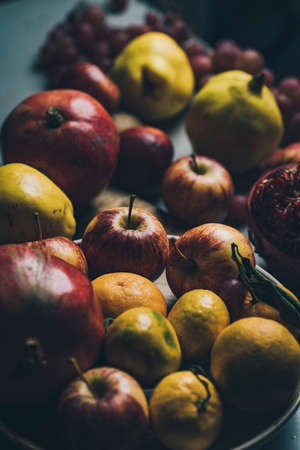 Dark baroque renaissance style still life photography of fruit and flowers