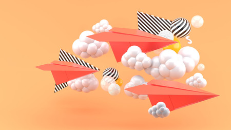 Red paper airplane amid clouds on orange background.-3d render.