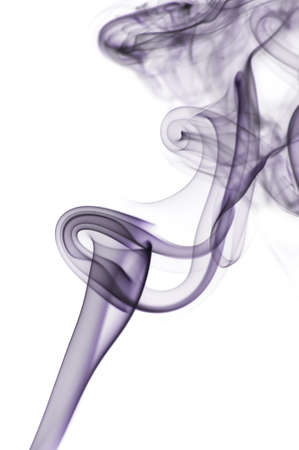 Floating colored smoke waves on solid background の写真素材