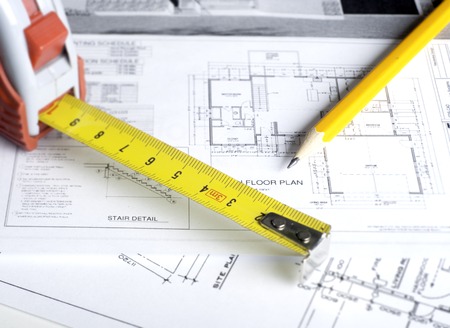 Construction planning drawings on the table and two yellow pencilsの写真素材