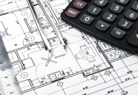 Construction planning drawings on the table and two yellow pencilsの写真素材
