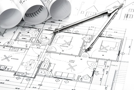 Construction planning drawings on the table and two yellow pencilsの写真素材