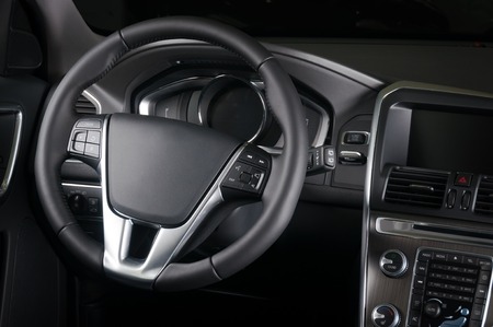 Brand new business car interior in white leather and wood, backseat viewの写真素材