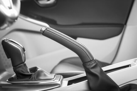 car interior transmission closeup with leather stitchの写真素材