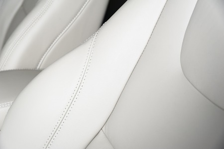 Leather car seats. Interior detail with stitchの写真素材