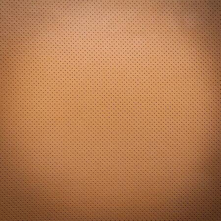 Yellow or light brown natural leather background or texture close upの写真素材