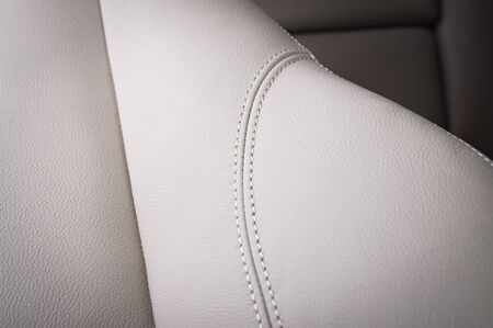 Leather car seats. Interior detail with stitchの写真素材