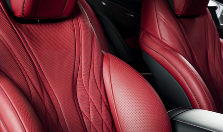 Modern luxury race car red leather interior. Sport seats detailsの写真素材