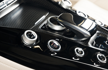 Modern car interior, race car dashboard buttons detailの写真素材