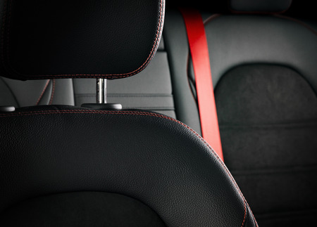 Modern luxury race car black leather with red stitch interior interior