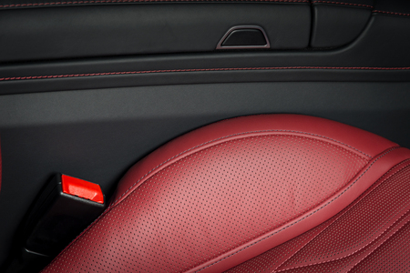 Modern luxury race car red leather interior. Sport seats detailsの写真素材