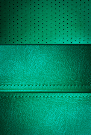 Indigi green leather sample with  stitching, leather texture backgroundの写真素材