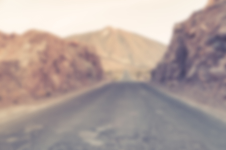 Blurred defocused road with beautiful mountain ridge landscapeの写真素材