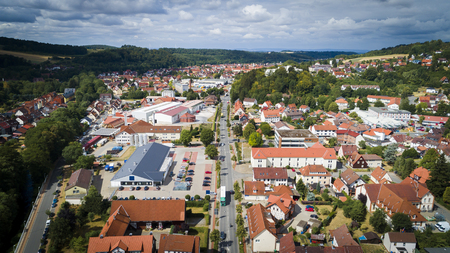 Aerial drone bird's eye view photo of famous and picturesque european village of central germany with red roofs and cozy streetsの写真素材