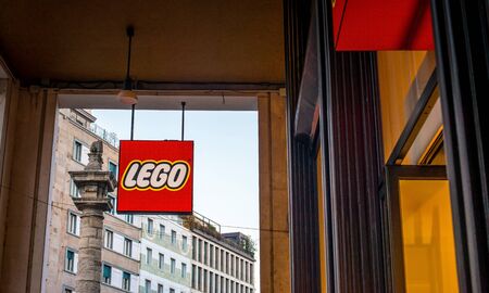 Milan, Italy, 20 December 2018: Lego logo on a store building. Lego is a line of plastic construction toys that are manufactured by The Lego Group, a privately held company based in Billund, Denmark.のeditorial素材