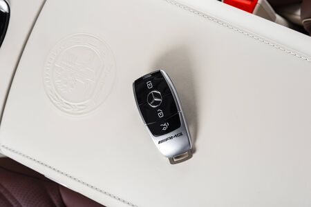 Sankt-Petersburg, Russia, January 12, 2018: Close up of key of Mercedes Benz AmG in red perforated leather interior, on the car seatのeditorial素材