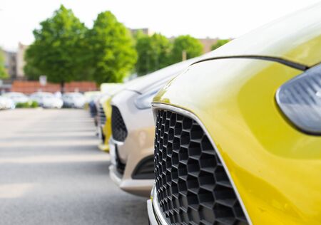 Vibrant new cars for sale stock lot rowの写真素材