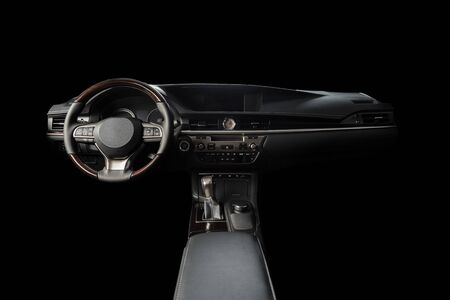 Black leather luxury car inside Interior - steering wheel, shift lever and dashboard.の写真素材