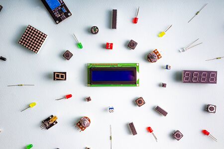 Micro electronics arduino DIY components on a light background, top view, copy space. Microcontrollers, boards, sensors, leds, controllersの写真素材