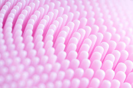 Macro Pink silicone massage brush surface texture close up for backgroundの写真素材