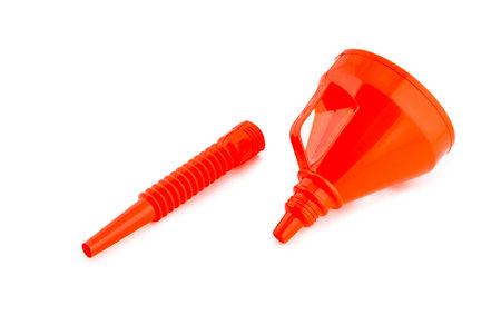 Red Plastic Funnel for gasoline and other technical liquids isolated over white background High Quality Studio Shotの写真素材