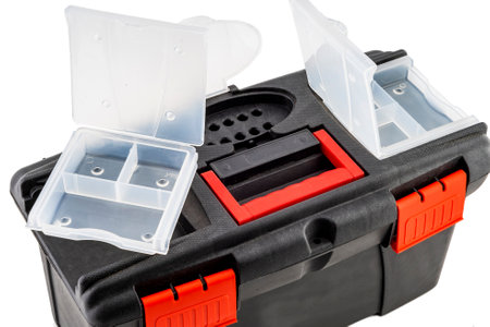 Plastic box for repair tools over white background