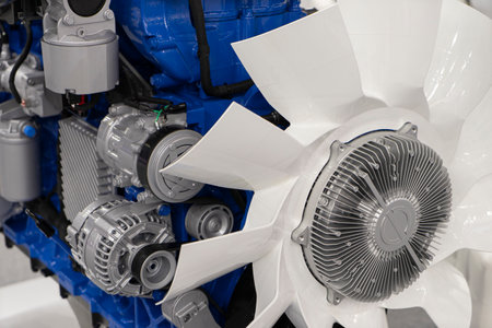 New blue and white internal combustion engine electric generator with belt radiator cooling fan