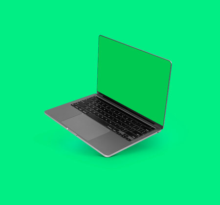 Photo of realistic modern laptop with blank green screen floating in front of a green backgroundの写真素材