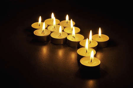 Burning candles in the form of a flower        の写真素材