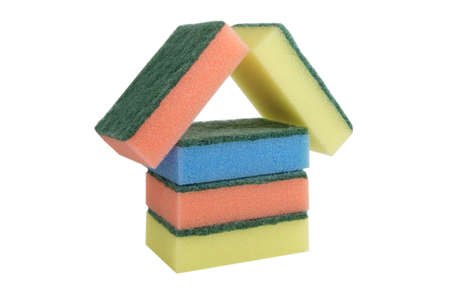 Kitchen sponges in the form of a small house of red, yellow, dark blue color on a white background         の写真素材