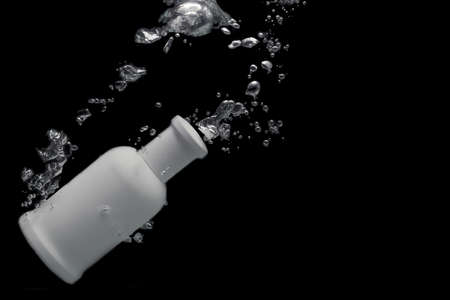 Perfume in the background of splashes, space for text