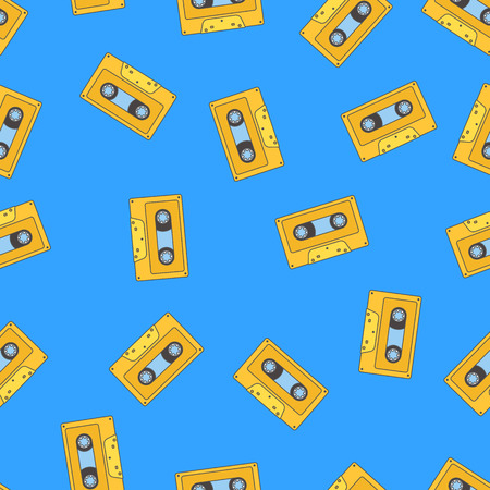 Seamless pattern with yellow retro audio tape on blue background.のイラスト素材