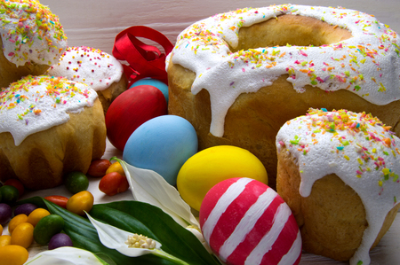 Easter eggs, different easter cake, candy and flower の写真素材