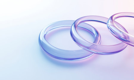A white background with three transparent glass rings, the edges of which form circles in different sizes, creating an abstract and modern composition. The rings have a blue tint on one side and light purple reflections inside them. A shiny effect adds depth to the scene. --ar 5:3 --v 6.1 Job ID: e9c746f6-26bd-4091-a86f-94ca7cab31e1の素材