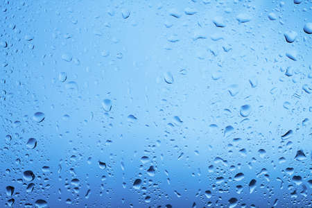 waterdrops on the glass backgroundの写真素材