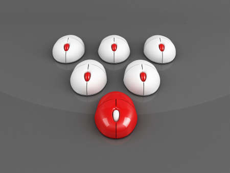 leading computer mouse over grey backgroundの写真素材